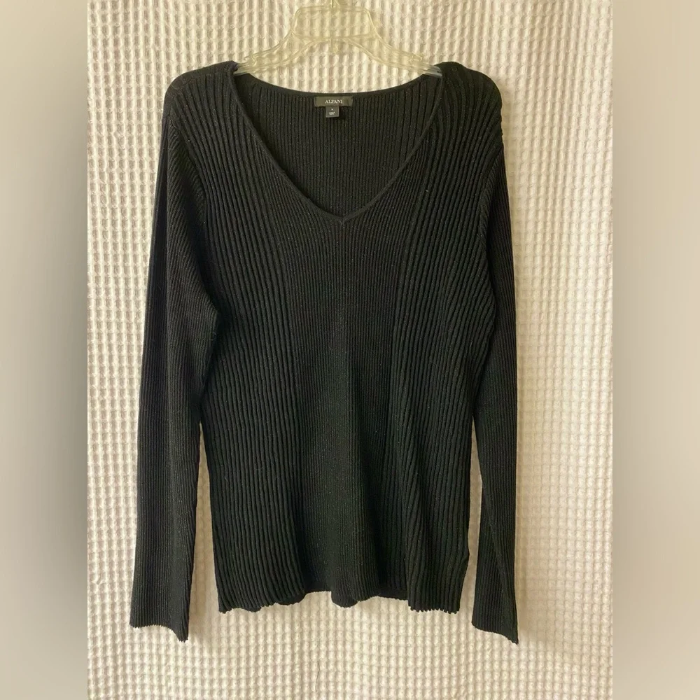 Long sleeved, stretchy shirt. Neckline- V-neck. Color- Black and shimmery. - Picture 1 of 3